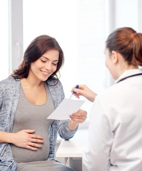 pregnancy-gynecology-medicine-health-care-people-concept-gynecologist-doctor-with-prescription-pregnant-woman-meeting-hospital_380164-136562